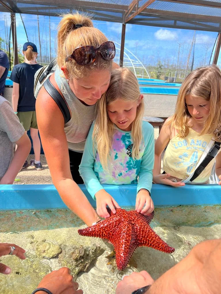 Our children discovering a starfish in Grand Bahama