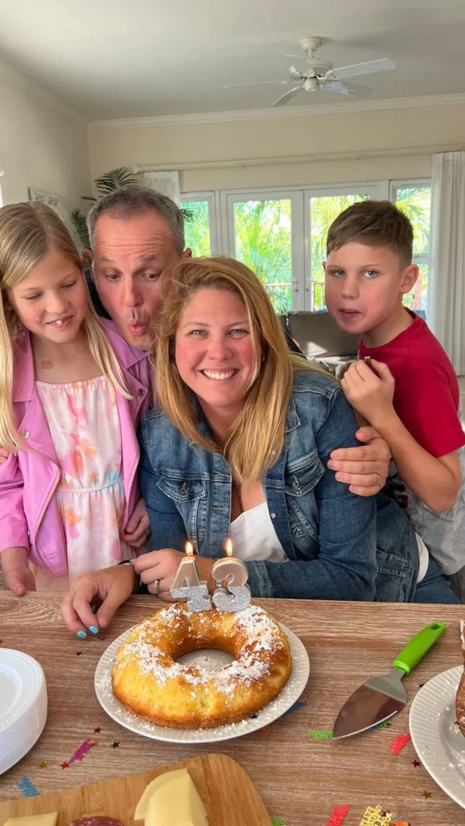 Pamela celebrating at home with her children during their early life in Grand Bahama
