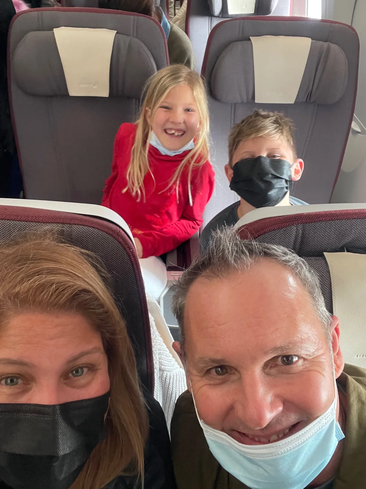 Pamela, Christoph and their children traveling together on their first journey to Grand Bahama